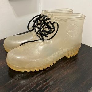 Clear rain boots.
